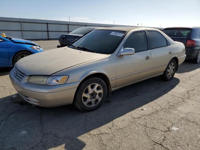 TOYOTA CAMRY LE 1997 with VIN JT2BF22K9V0036710 - Photo from auction