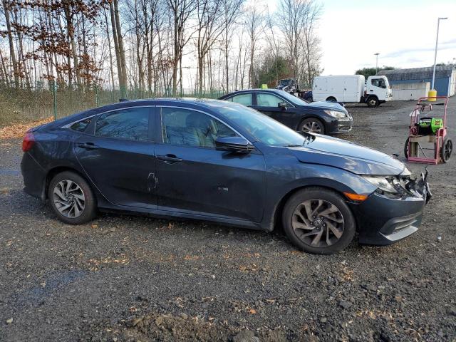 Photo 4 from auction – 2017 HONDA CIVIC EX with VIN 2HGFC2F77HH525115