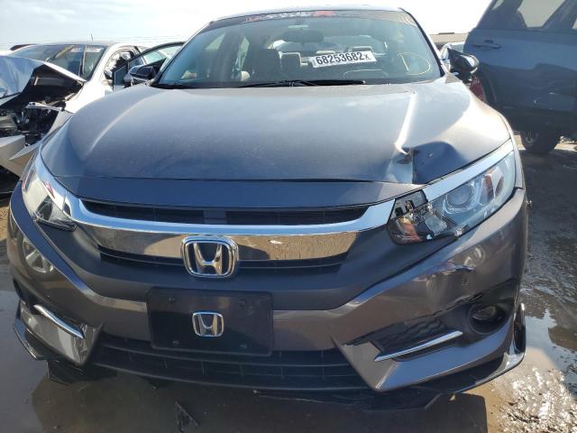 Photo 5 from auction – 2018 HONDA CIVIC EX with VIN JHMFC1F31JX015350