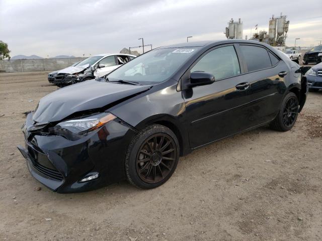 TOYOTA COROLLA L 2017 with VIN 5YFBURHE6HP611265 - Photo from auction