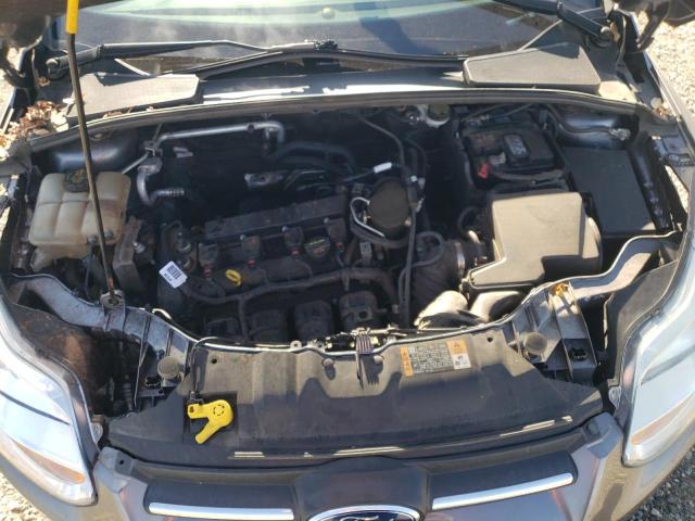 Photo 11 from auction – 2014 FORD FOCUS SE with VIN 1FADP3F23EL277714