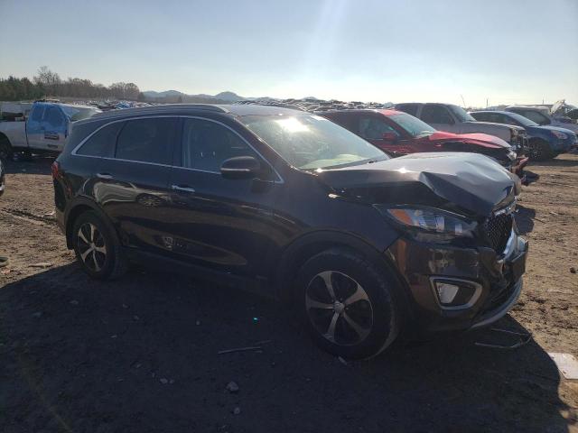 Photo 4 from auction – 2016 KIA SORENTO EX with VIN 5XYPHDA18GG047139