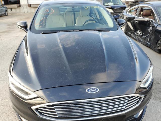 Photo 5 from auction – 2018 FORD FUSION TIT with VIN 3FA6P0D92JR163268