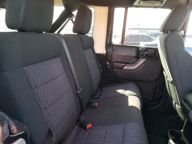Photo 11 from auction – 2011 JEEP WRANGLER U with VIN 1J4HA3H1XBL565673