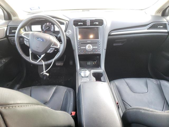 Photo 8 from auction – 2019 FORD FUSION TIT with VIN 3FA6P0D94KR140897
