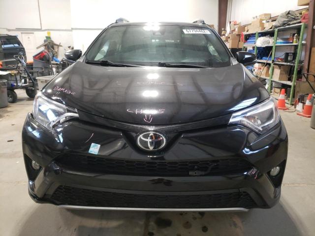 Photo 5 from auction – 2018 TOYOTA RAV4 SE with VIN 2T3JFREV8JW819041