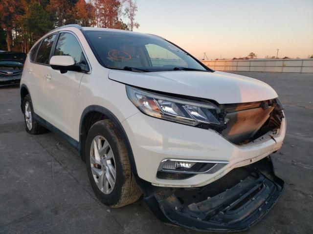 Photo 4 from auction – 2015 HONDA CR-V EXL with VIN 5J6RM4H79FL081134