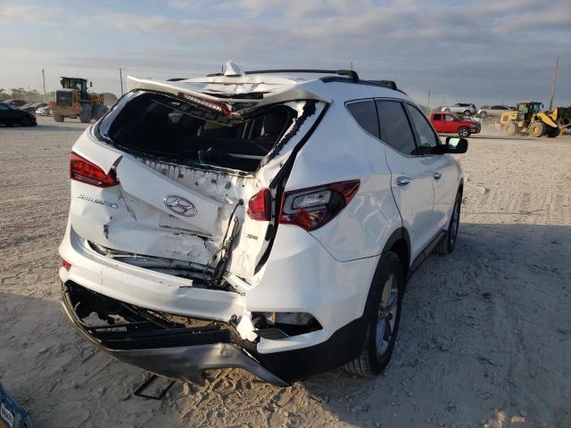 Photo 3 from auction – 2018 HYUNDAI SANTA FE S with VIN 5NMZU3LB1JH077343