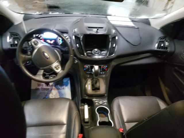 Photo 8 from auction – 2015 FORD ESCAPE TIT with VIN 1FMCU9J97FUA72376