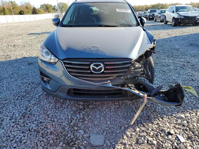 Photo 5 from auction – 2016 MAZDA CX-5 TOURI with VIN JM3KE2CY2G0663854