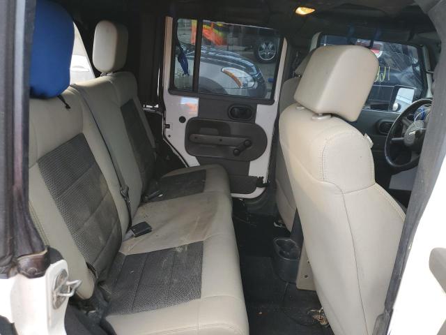 Photo 10 from auction – 2008 JEEP WRANGLER U with VIN 1J8GA39128L594716
