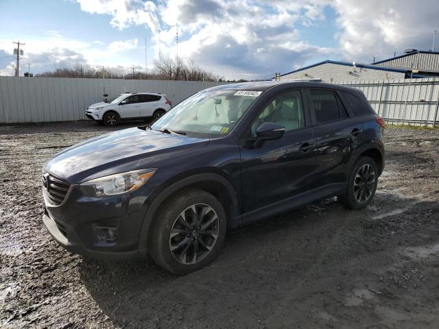 MAZDA CX-5 GT 2016 with VIN JM3KE4DY6G0671014 - Photo from auction