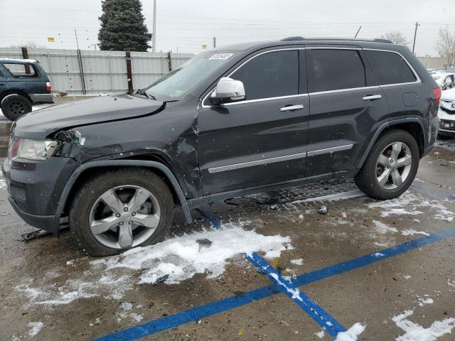 JEEP GRAND CHER 2011 with VIN 1J4RR6GG3BC608299 - Photo from auction
