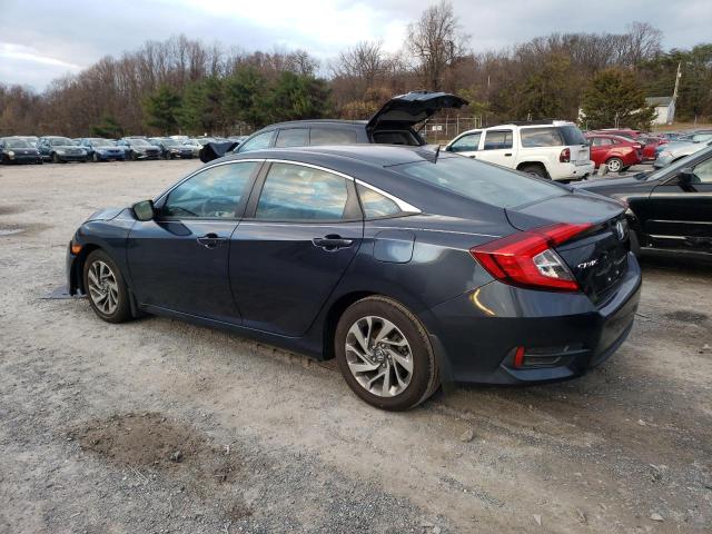 Photo 2 from auction – 2018 HONDA CIVIC EX with VIN 2HGFC2F74JH516636