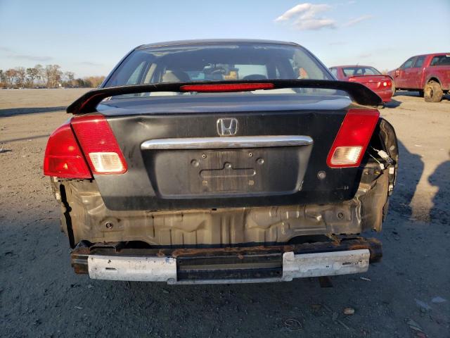 Photo 6 from auction – 2002 HONDA CIVIC LX with VIN 1HGES16532L064366