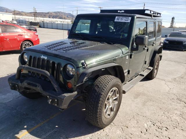 JEEP WRANGLER U 2011 with VIN 1J4HA3H1XBL565673 - Photo from auction