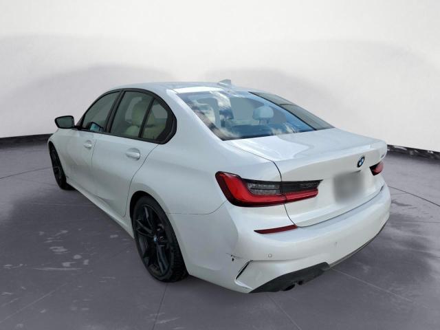 Photo 2 from auction – 2021 BMW 330I with VIN 3MW5R1J01M8B81554