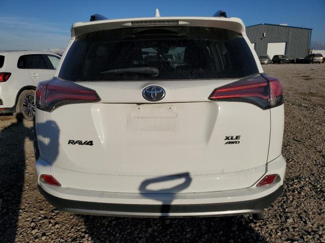 Photo 6 from auction – 2017 TOYOTA RAV4 XLE with VIN 2T3RFREV1HW594023