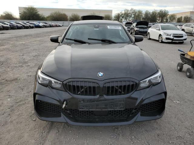 Photo 5 from auction – 2020 BMW 330I with VIN 3MW5R1J09L8B44881