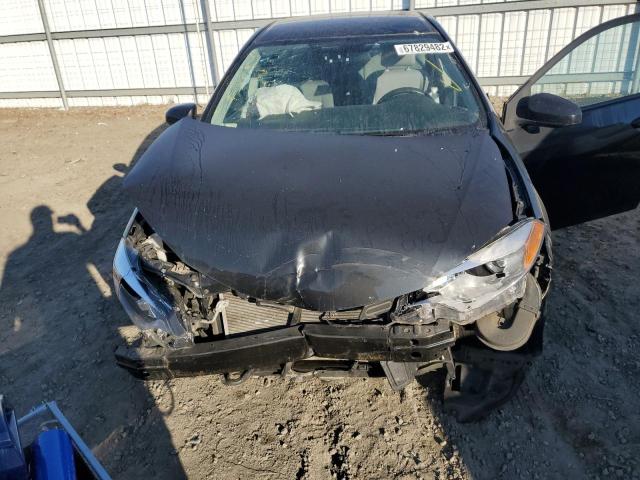 Photo 11 from auction – 2014 TOYOTA COROLLA L with VIN 2T1BURHE5EC077266