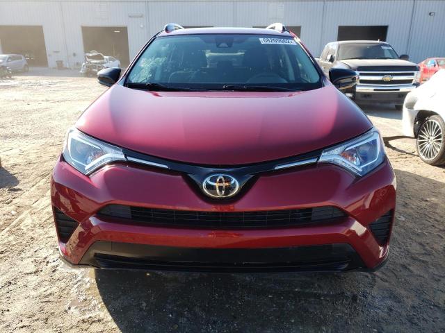 Photo 5 from auction – 2018 TOYOTA RAV4 LE with VIN 2T3BFREV4JW745847