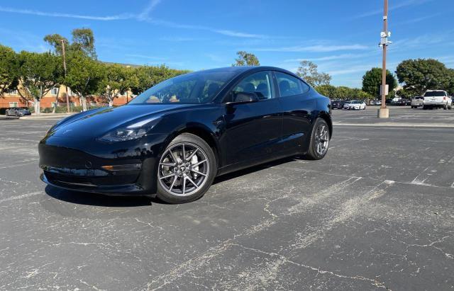 Photo 2 from auction – 2021 TESLA MODEL 3 with VIN 5YJ3E1EB8MF037089