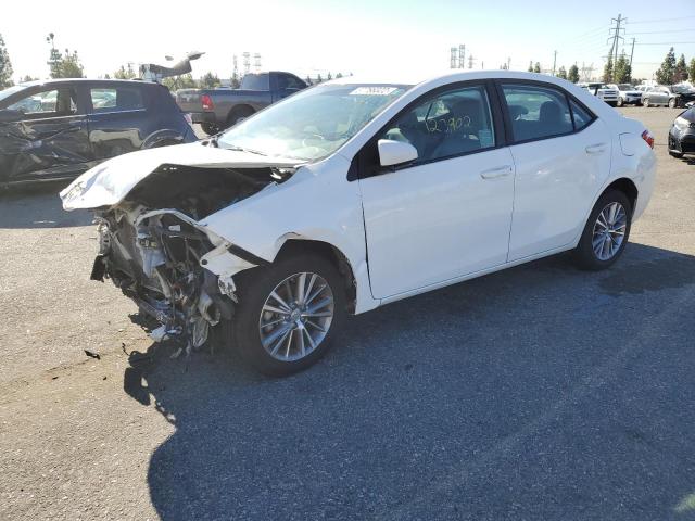 TOYOTA COROLLA L 2014 with VIN 5YFBURHE0EP021106 - Photo from auction