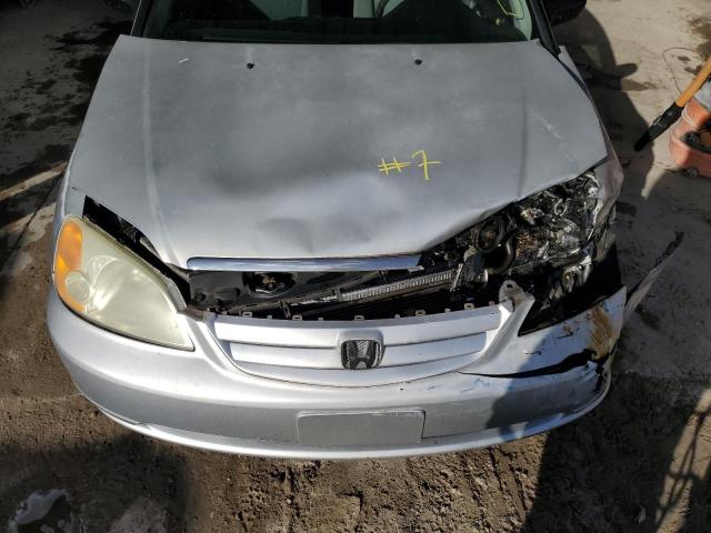 Photo 11 from auction – 2003 HONDA CIVIC LX with VIN 2HGES16523H566350