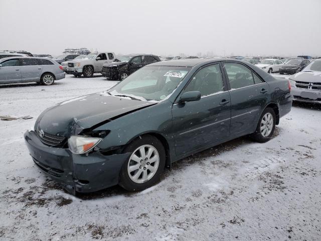 TOYOTA CAMRY LE 2004 with VIN 4T1BF30K34U081760 - Photo from auction