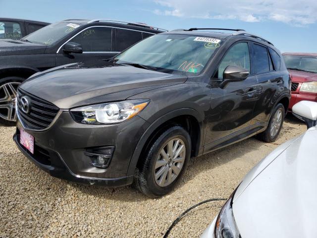 MAZDA CX-5 TOURI 2016 with VIN JM3KE2CY8G0844344 - Photo from auction