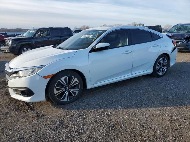 HONDA CIVIC EXL 2016 with VIN 2HGFC1F74GH631711 - Photo from auction