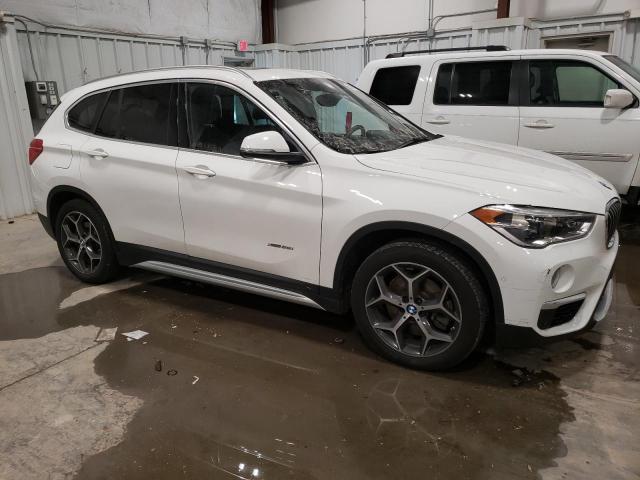 Photo 4 from auction – 2016 BMW X1 XDRIVE2 with VIN WBXHT3Z30G4A49779
