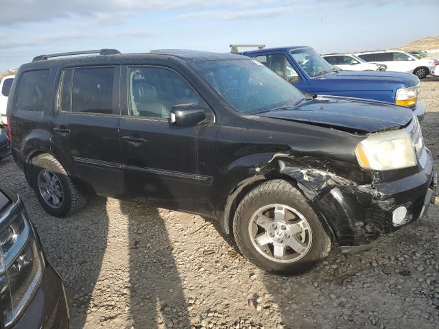 Photo 4 from auction – 2011 HONDA PILOT TOUR with VIN 5FNYF3H91BB010756
