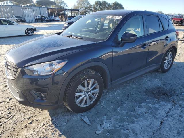 MAZDA CX-5 TOURI 2016 with VIN JM3KE4CY5G0850324 - Photo from auction