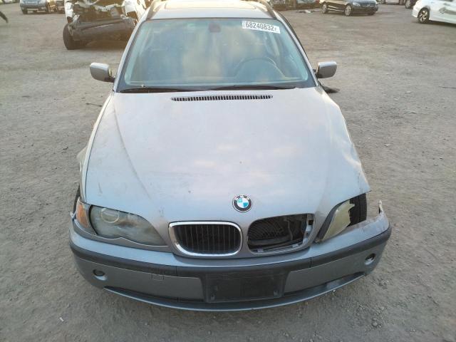 Photo 11 from auction – 2004 BMW 325I with VIN WBAAX13434PJ00737