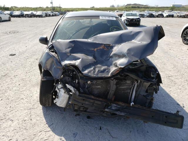 Photo 5 from auction – 2004 KIA RIO with VIN KNADC125146312495