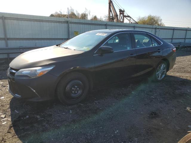 TOYOTA CAMRY LE 2015 with VIN 4T1BF1FK8FU915536 - Photo from auction