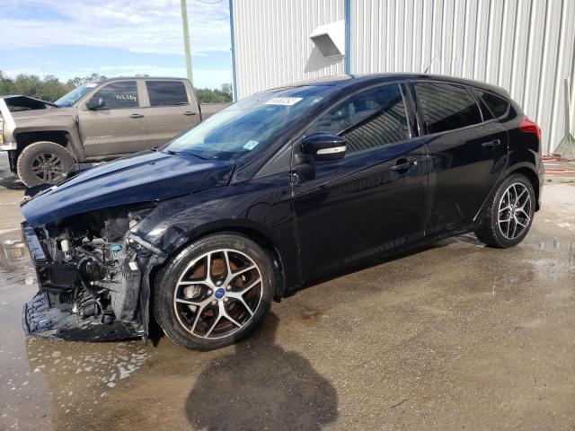 FORD FOCUS SE 2016 with VIN 1FADP3K21GL371440 - Photo from auction