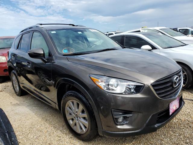 Photo 4 from auction – 2016 MAZDA CX-5 TOURI with VIN JM3KE2CY8G0844344