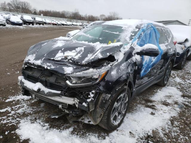 Photo 2 from auction – 2018 HONDA CR-V EX with VIN 7FARW2H50JE028695