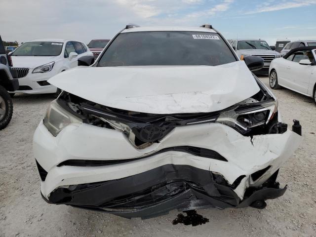 Photo 5 from auction – 2016 TOYOTA RAV4 LE with VIN JTMZFREV0GJ083268