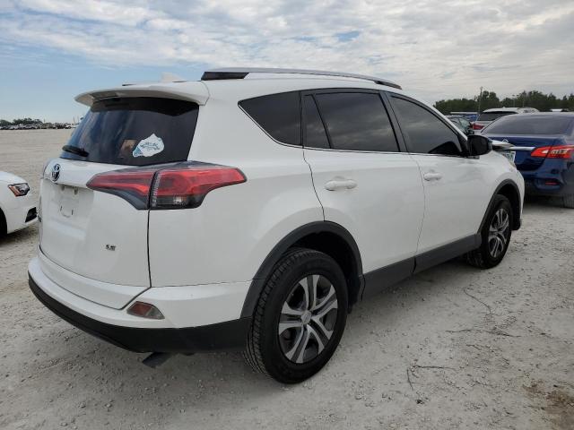 Photo 3 from auction – 2016 TOYOTA RAV4 LE with VIN JTMZFREV0GJ083268