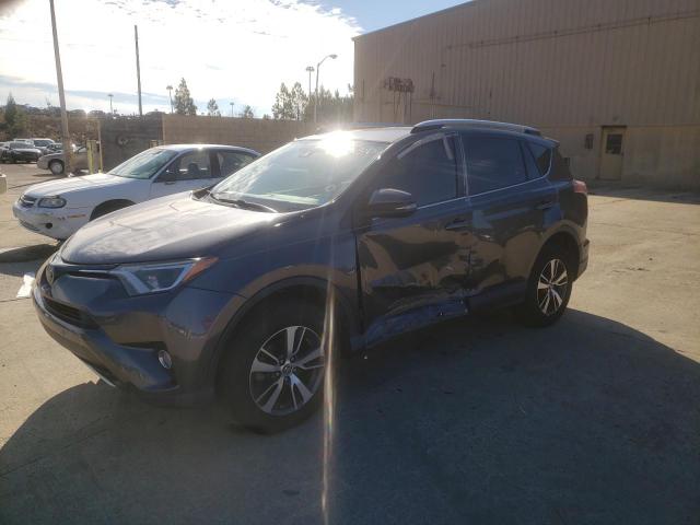 TOYOTA RAV4 XLE 2016 with VIN JTMWFREV2GJ064255 - Photo from auction