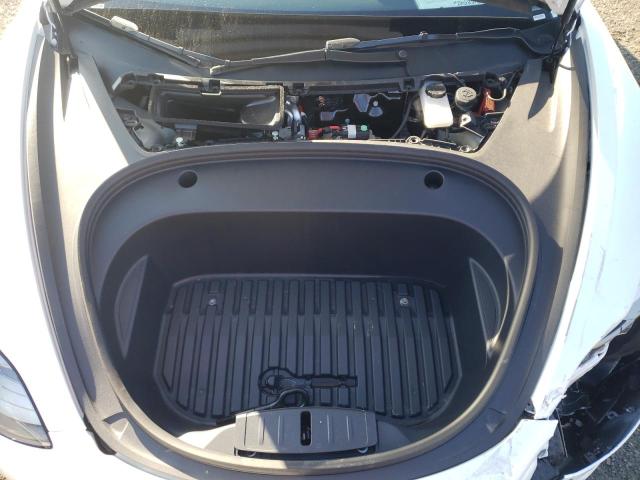 Photo 11 from auction – 2022 TESLA MODEL 3 with VIN 5YJ3E1EB9NF192428