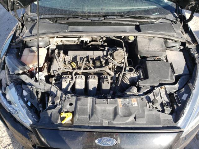 Photo 11 from auction – 2015 FORD FOCUS SE with VIN 1FADP3F28FL329968