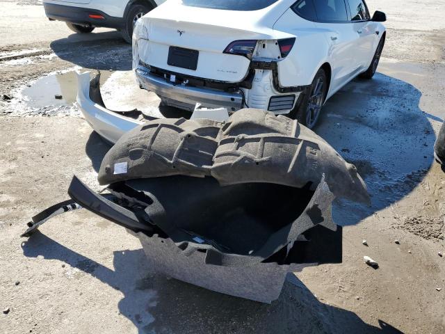 Photo 12 from auction – 2021 TESLA MODEL 3 with VIN 5YJ3E1EB6MF979027