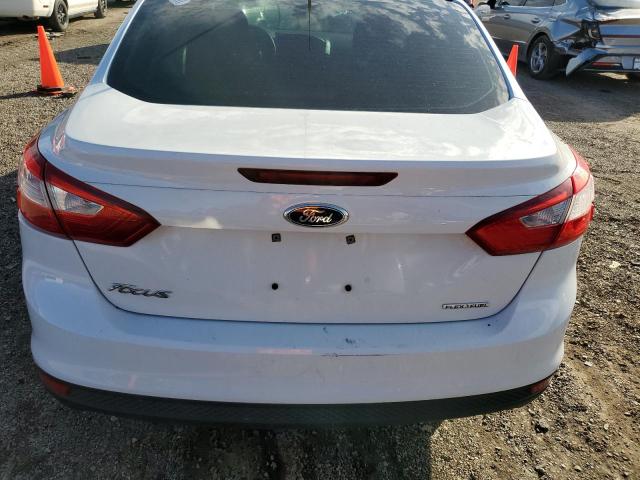 Photo 6 from auction – 2014 FORD FOCUS S with VIN 1FADP3E27EL268676