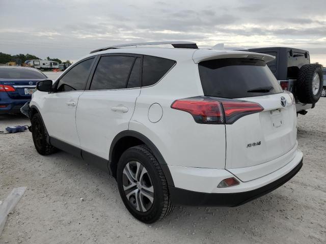 Photo 2 from auction – 2016 TOYOTA RAV4 LE with VIN JTMZFREV0GJ083268