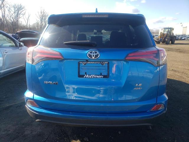 Photo 6 from auction – 2018 TOYOTA RAV4 LE with VIN JTMBFREV3JJ254877