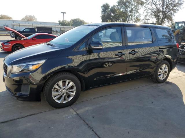 KIA SEDONA L 2015 with VIN KNDMA5C18F6026142 - Photo from auction